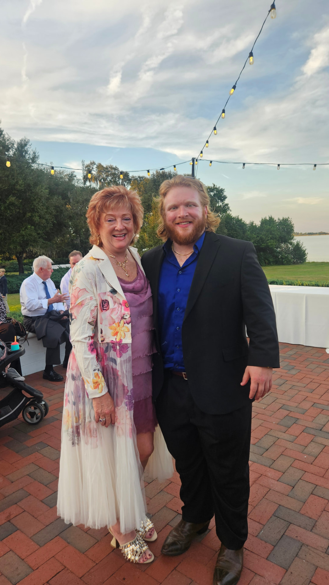 Tina and Jackson Leger at a lakeside event in Central Florida